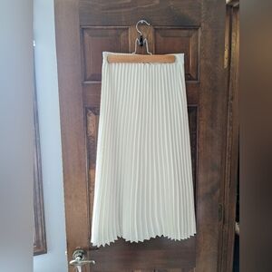 White pleated skirt